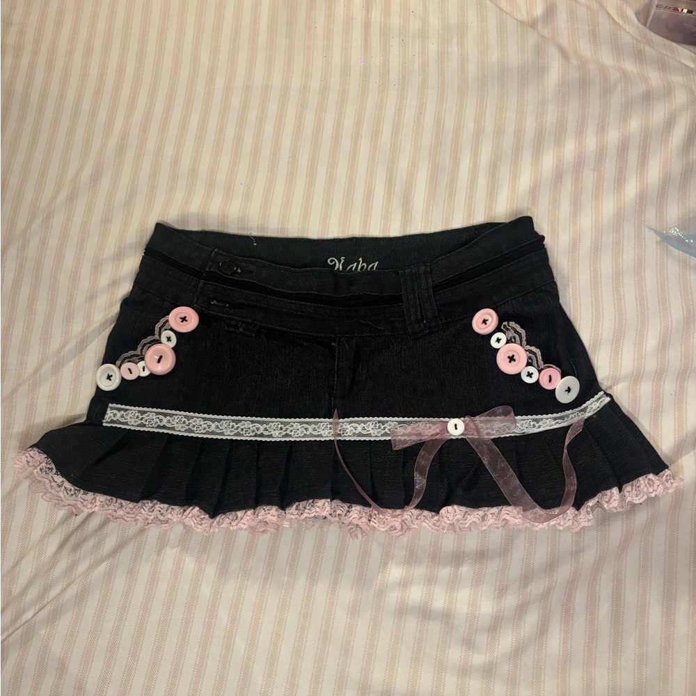 Elegant Black Mini Skirt with Pink Button Details